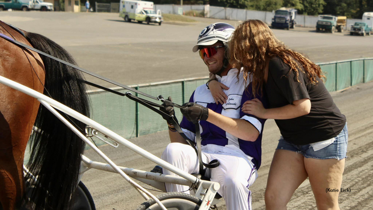 John James Urbanski celebrates his first driving win with sister Alex