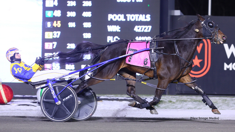 Self Made and driver Jonathan Drury winning at Woodbine Mohawk Park