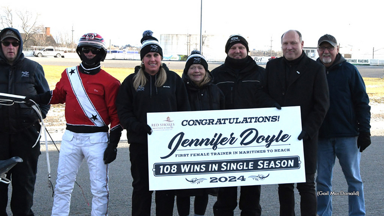 Jennifer Doyle celebrates breaking the Atlantic Canada record for most wins in a season by a female trainer