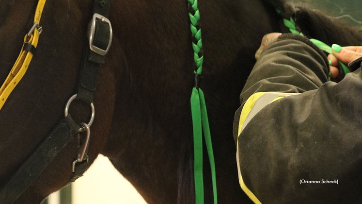 Century Downs racing participants display green ribbons in memory of Hunter Myers