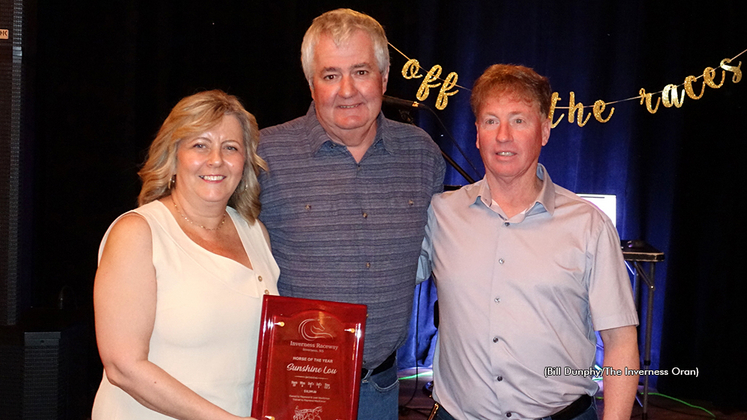 Sunshine Lou's owners accepting hisInverness Horse of the Year award