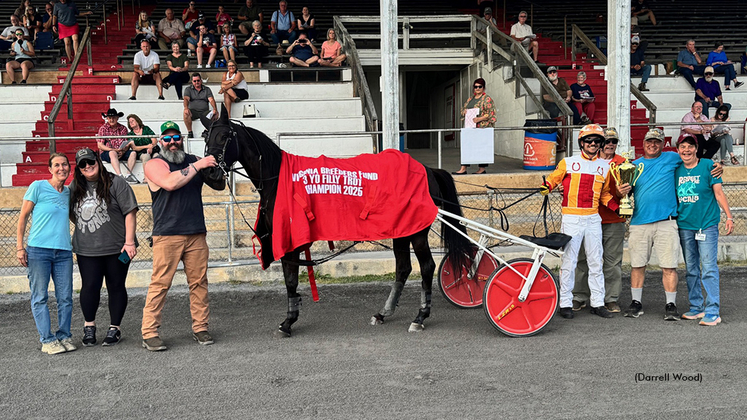 Kats Fancy in the winner's circle at Shenandoah Downs