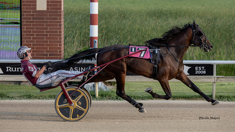Al Mar Flash Over winning at Running Aces