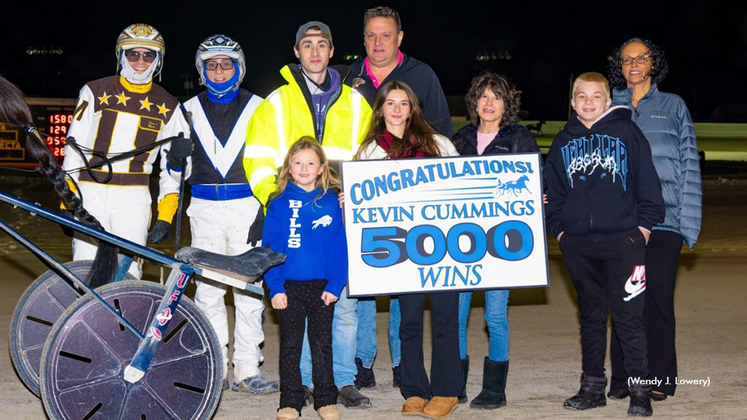 Kevin Cummings receiving a 5,000th win presentation
