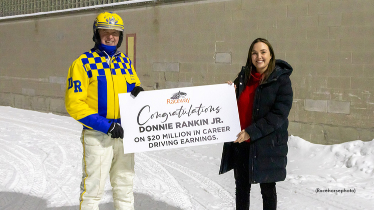 Donnie Rankin receiving a ceremonial placard